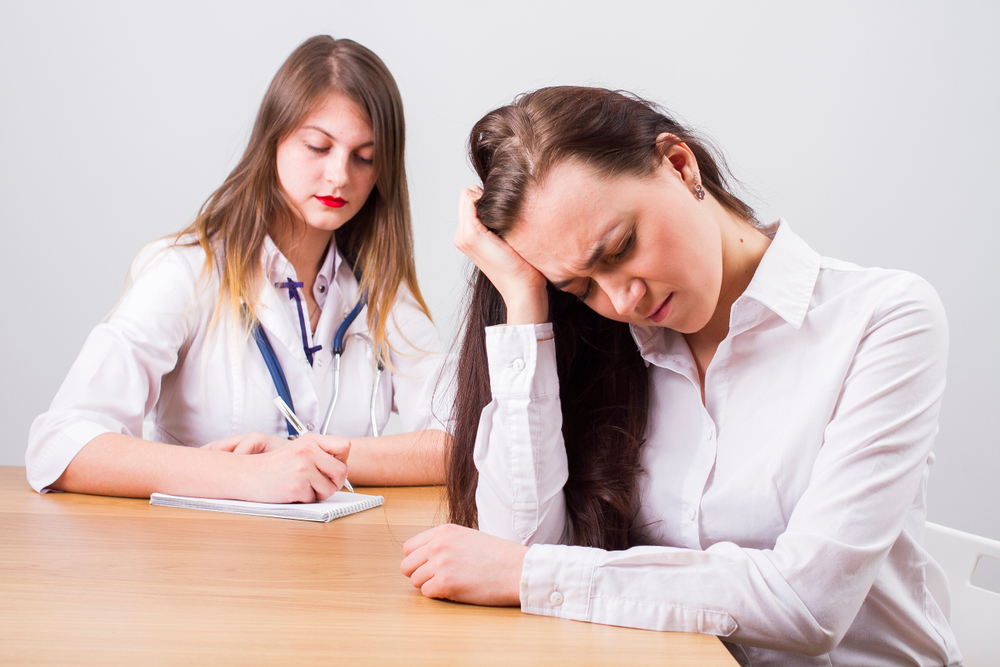 pain management doctor with a patient in an OKC clinic.jpg
